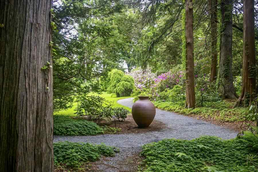 sculptural pots inside the yard, with stephen procter